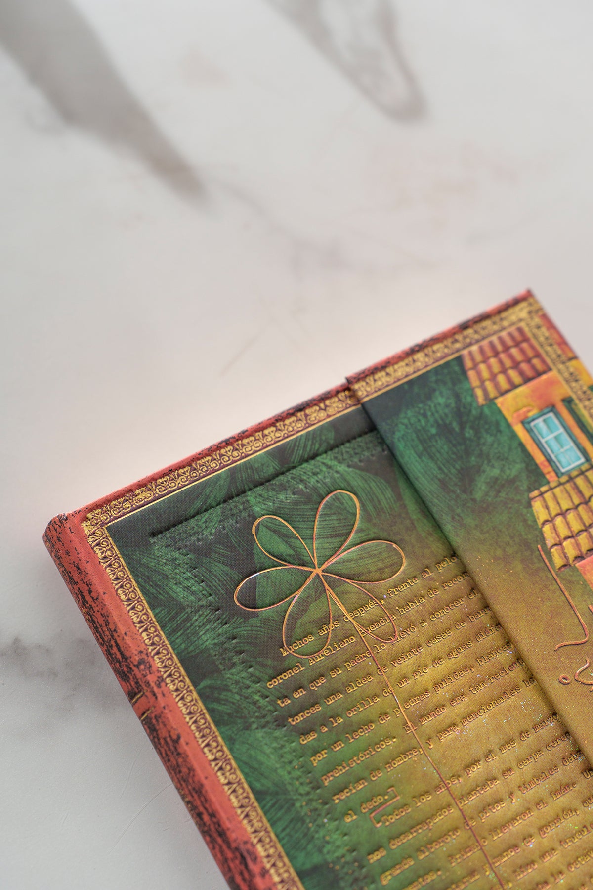 Paperblanks Garcia Marquez, One Hundred Years of Solitude Ultra Hardback Journal – Lined, 144 Pages – lifestyle image