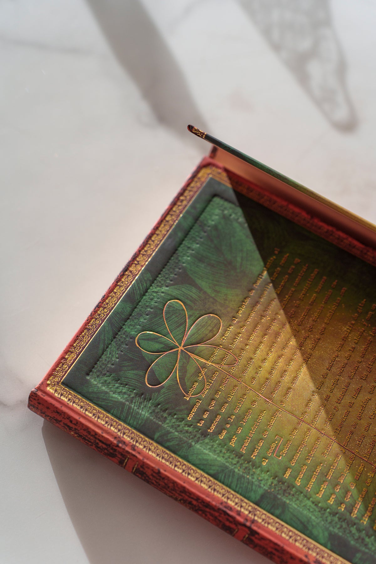 Paperblanks Garcia Marquez, One Hundred Years of Solitude Ultra Hardback Journal – Plain, 144 Pages – lifestyle image