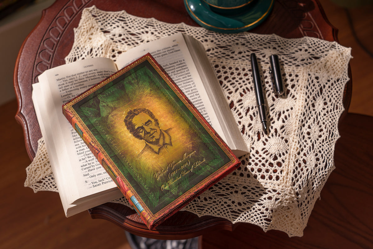Paperblanks Garcia Marquez, One Hundred Years of Solitude Ultra Hardback Journal – Plain, 144 Pages – lifestyle image