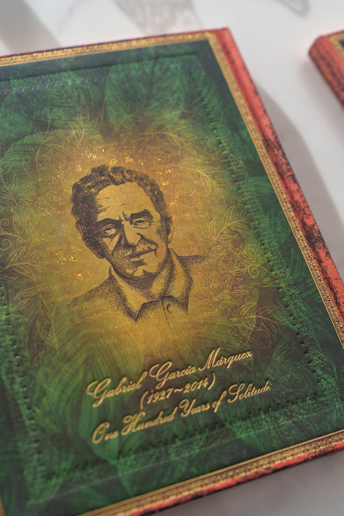 Paperblanks Garcia Marquez, One Hundred Years of Solitude Ultra Hardback Journal – Plain, 144 Pages – lifestyle image