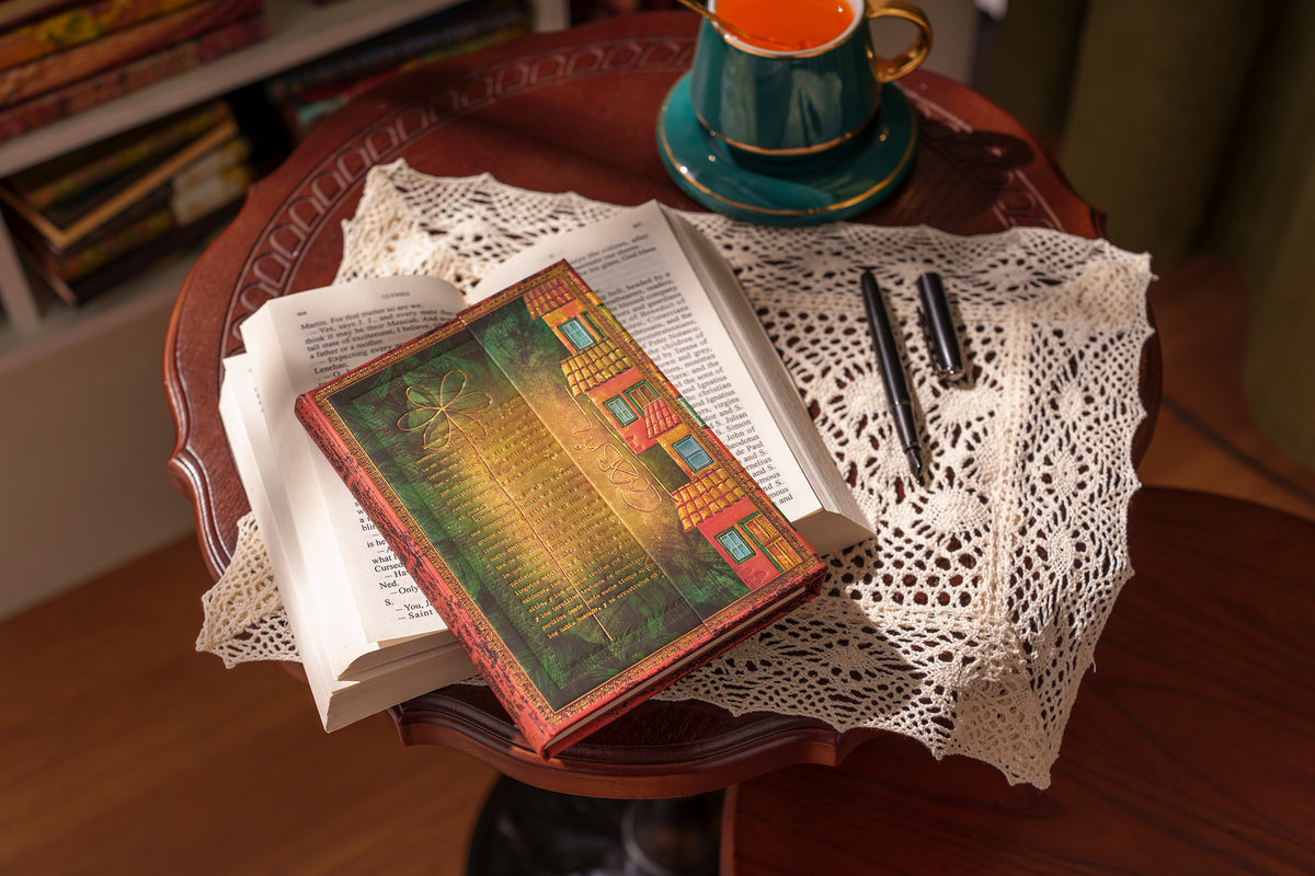 Paperblanks Garcia Marquez, One Hundred Years of Solitude Midi Hardback Journal – Plain, 144 Pages – lifestyle image