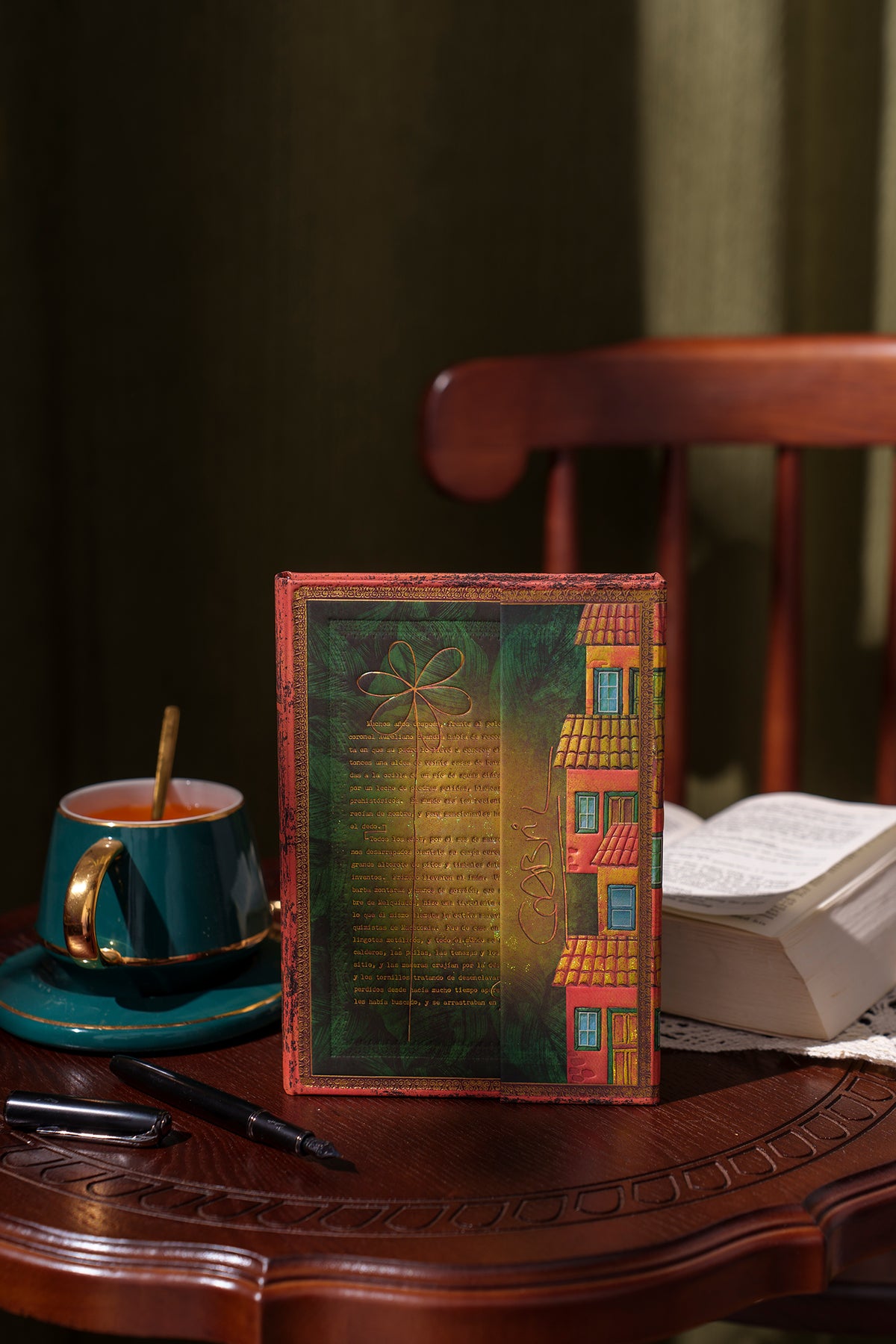 Paperblanks Garcia Marquez, One Hundred Years of Solitude Midi Hardback Journal – Plain, 144 Pages – lifestyle image