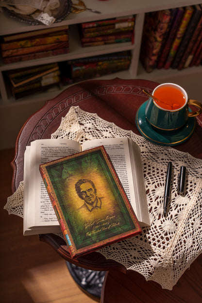Paperblanks Garcia Marquez, One Hundred Years of Solitude Midi Hardback Journal – Plain, 144 Pages – lifestyle image