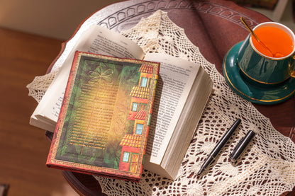 Paperblanks Garcia Marquez, One Hundred Years of Solitude Midi Hardback Journal – Plain, 144 Pages – lifestyle image