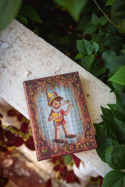 Paperblanks Carlo Collodi, Pinocchio Ultra Hardback Journal – Lined, 144 Pages – lifestyle image