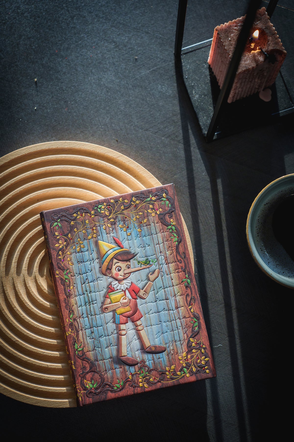 Paperblanks Carlo Collodi, Pinocchio Ultra Hardback Journal – Plain, 144 Pages – lifestyle image