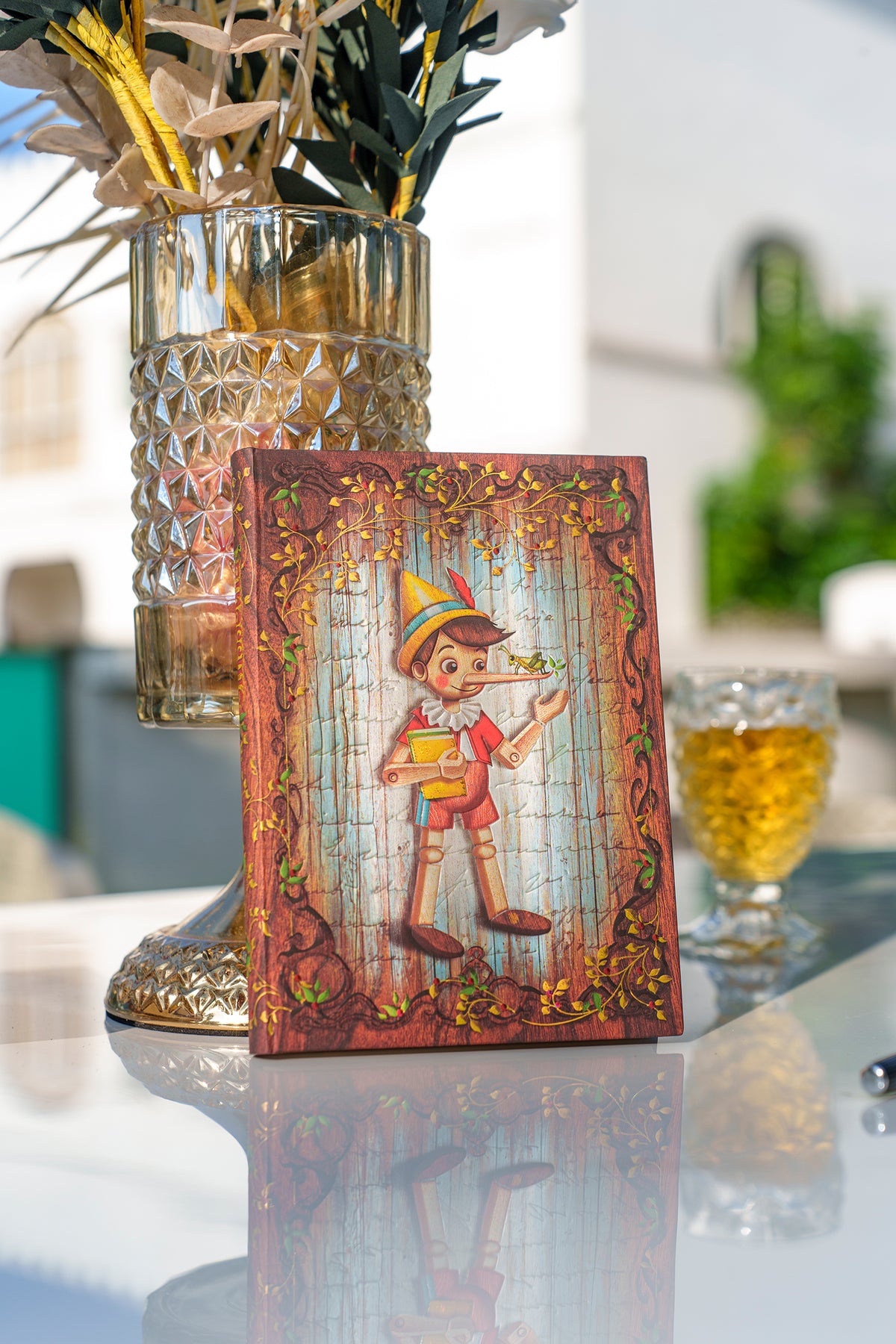 Paperblanks Carlo Collodi, Pinocchio Mini Hardback Journal – Plain, 176 Pages – lifestyle image