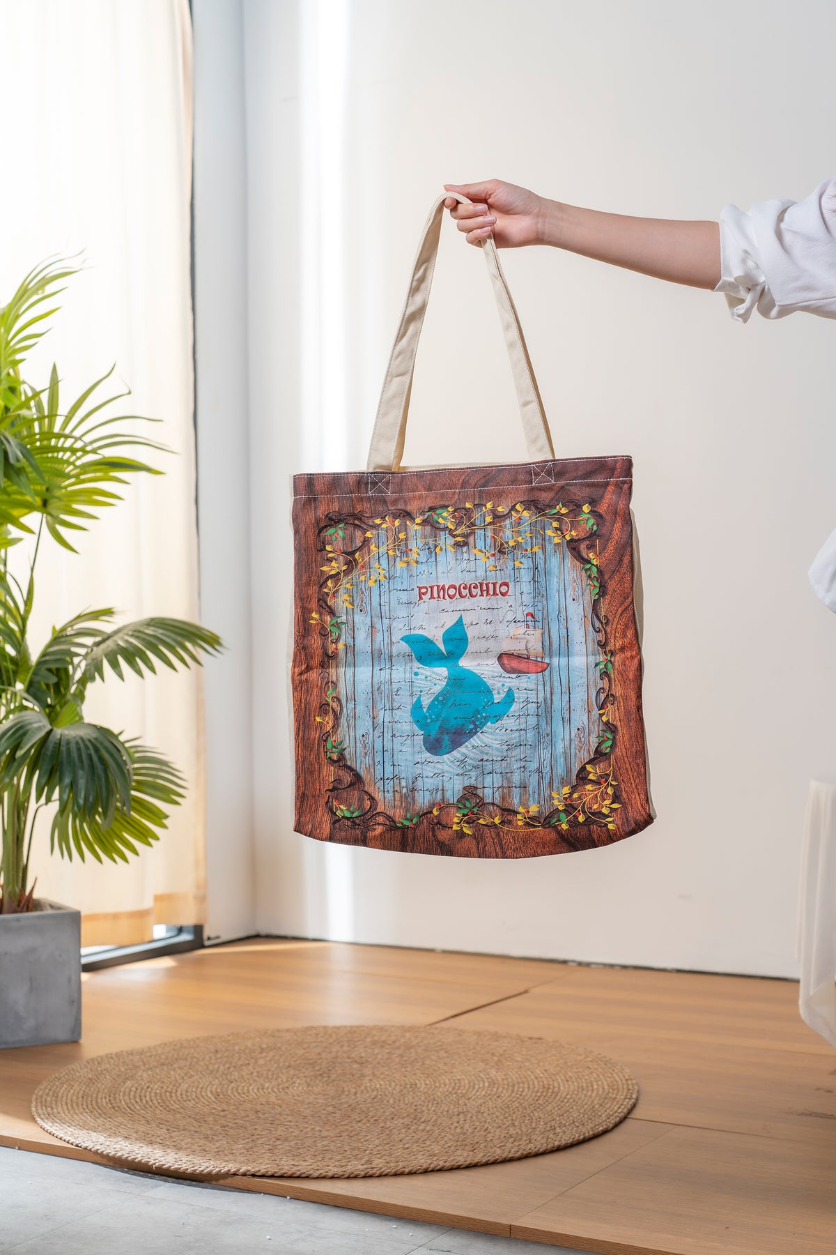 Paperblanks Carlo Collodi, Pinocchio Cotton Tote Bag – lifestyle image