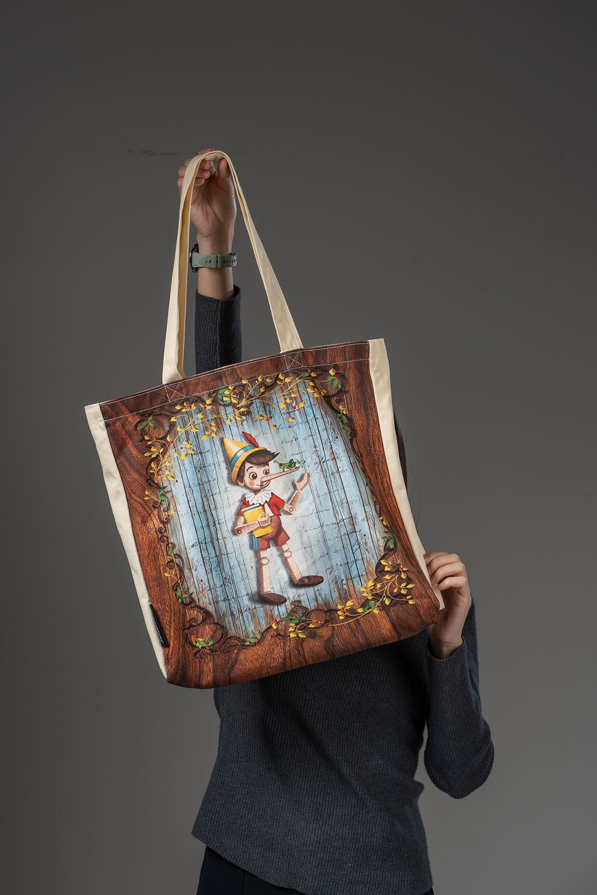 Paperblanks Carlo Collodi, Pinocchio Cotton Tote Bag – lifestyle image