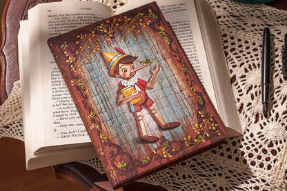 Paperblanks Carlo Collodi, Pinocchio Mini Hardback Journal – Plain, 176 Pages – design detail