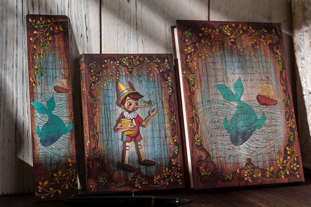 Paperblanks Carlo Collodi, Pinocchio Mini Hardback Journal – Plain, 176 Pages – design detail