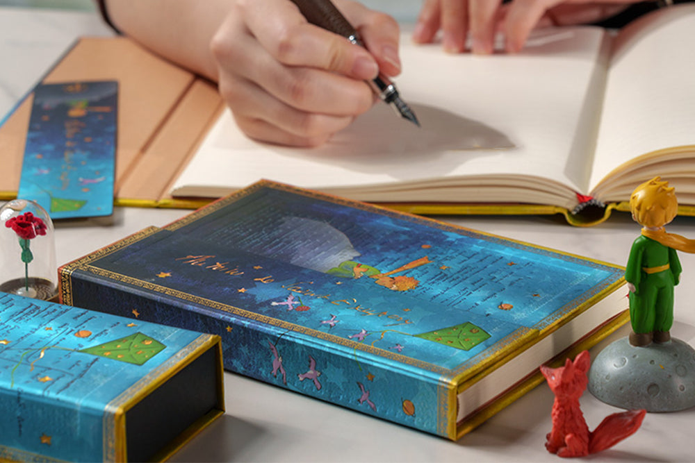 Paperblanks 2026–2027 Saint-Exupéry, The Little Prince Midi Hardback 18-Month Diary – Week-to-View Horizontal – design detail