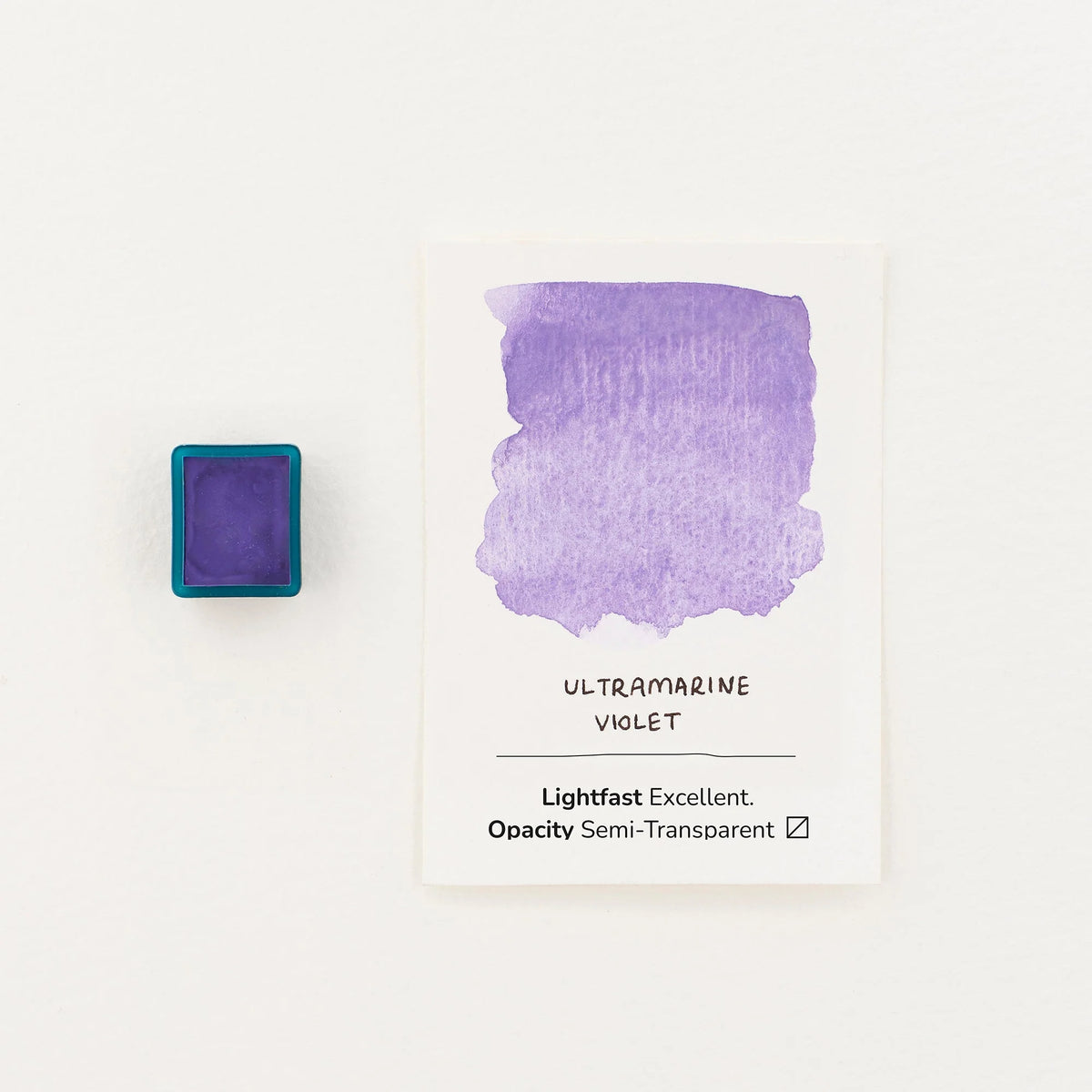 Ultramarine Violet watercolour half pan with colour swatch on a white background