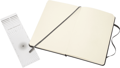 Open medium Moleskine sketchbook showing ivory sketch paper