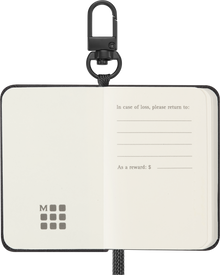 Moleskine The Mini notebook charm – open showing plain pages