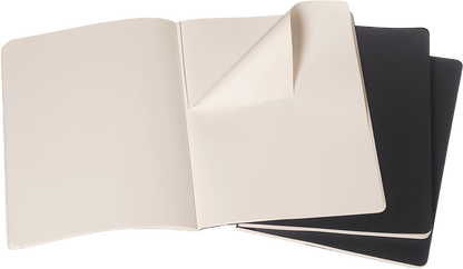 Moleskine extra large black Cahier Journal open showing plain ivory pages