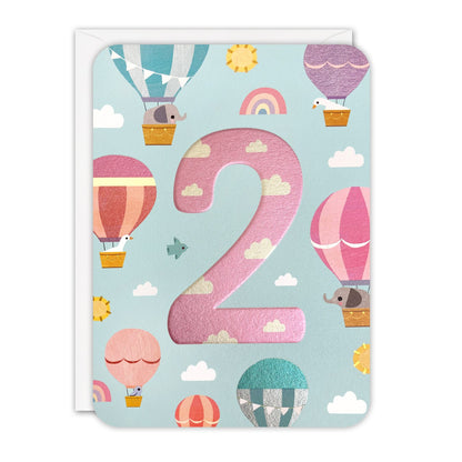 Sky blue 2nd birthday card with a large embossed pink foil number 2 among hot air balloons and rainbows