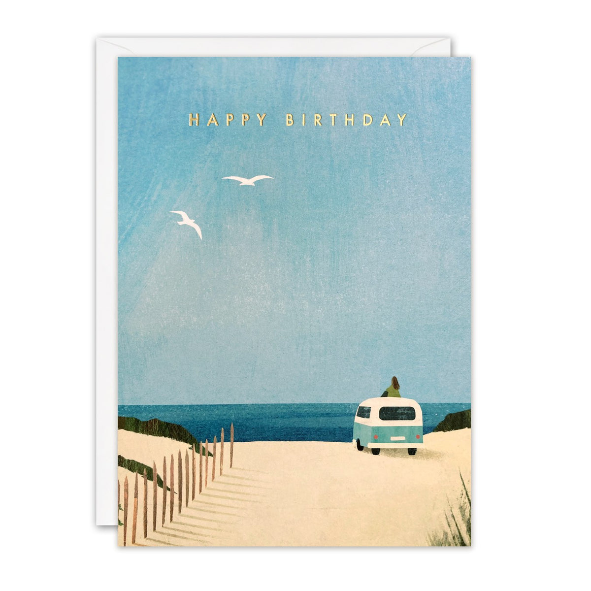Birthday card of a green campervan parked in sand dunes by the sea with gulls overhead, gold foil Happy Birthday