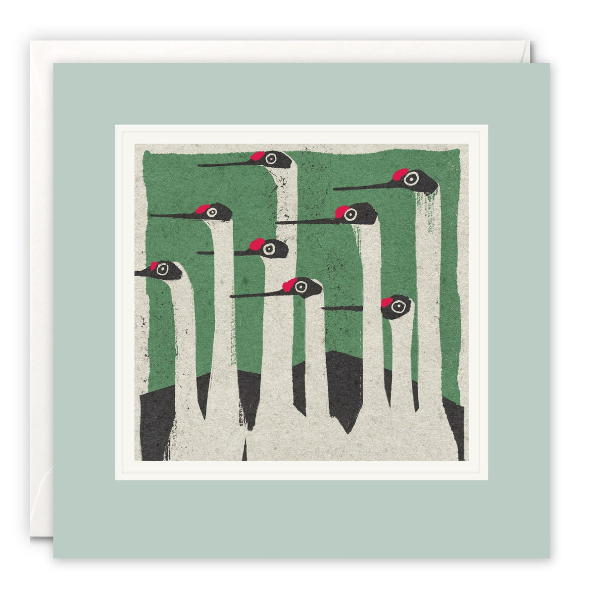 Graphic print of a group of red-capped cranes with long white necks against a green background