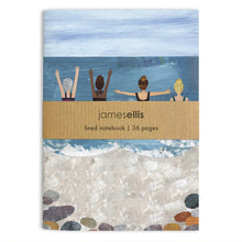A6 notebook cover showing four women swimmers raising their arms in the sea above a pebbly beach