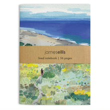 A6 notebook cover showing a walker on a dune path through grasses towards a blue sea and beach