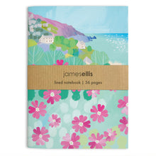 A6 notebook cover with pink red campion flowers, white cottages and cliffs above a turquoise sea
