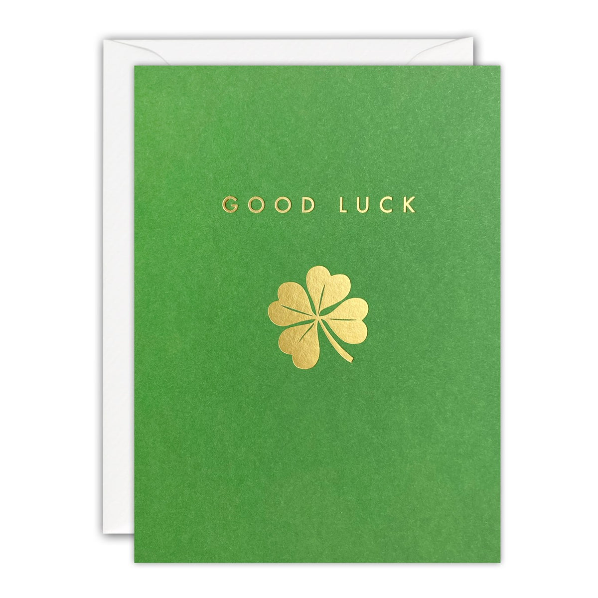 Green mini good luck card with a gold foil four-leaf clover and Good Luck in gold capitals