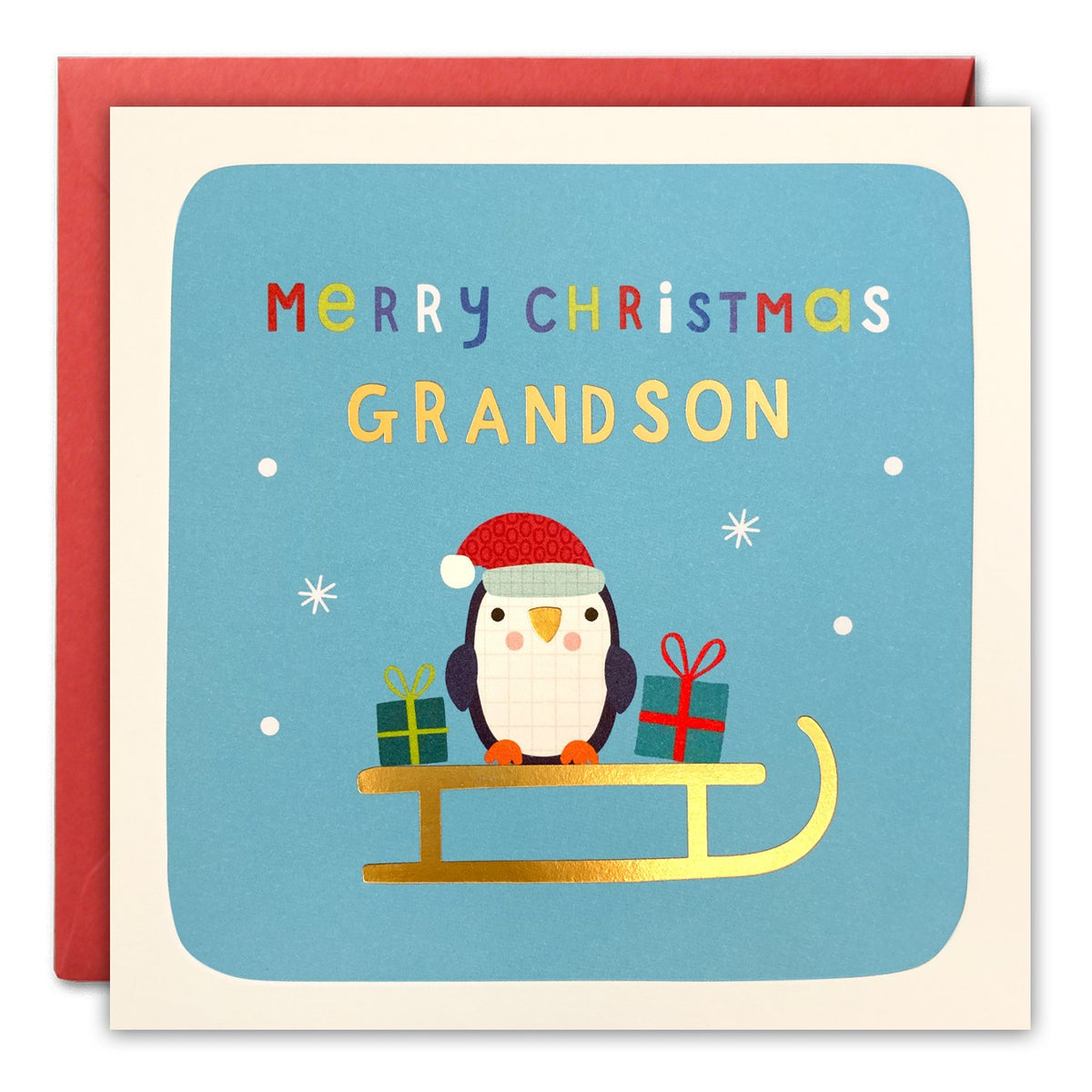 Christmas card for a grandson of a penguin on a gold sledge with presents, 'Merry Christmas Grandson'