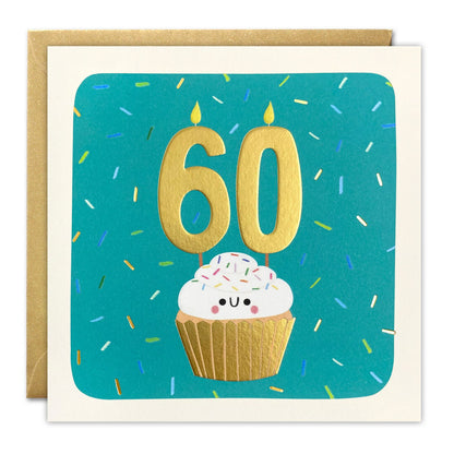 60th birthday card of a smiling cupcake with gold foil 60 candles on teal with confetti