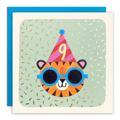 Age 9 birthday card of a tiger in blue sunglasses and party hat with gold 9 on mint green