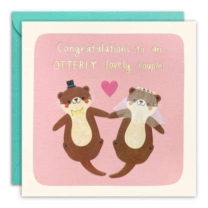 Wedding card of two otters in top hat and veil holding hands, gold foil 'Congratulations to an Otterly lovely couple!'