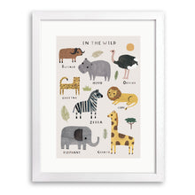 White wood framed print of labelled safari animals including a lion, elephant, zebra and giraffe