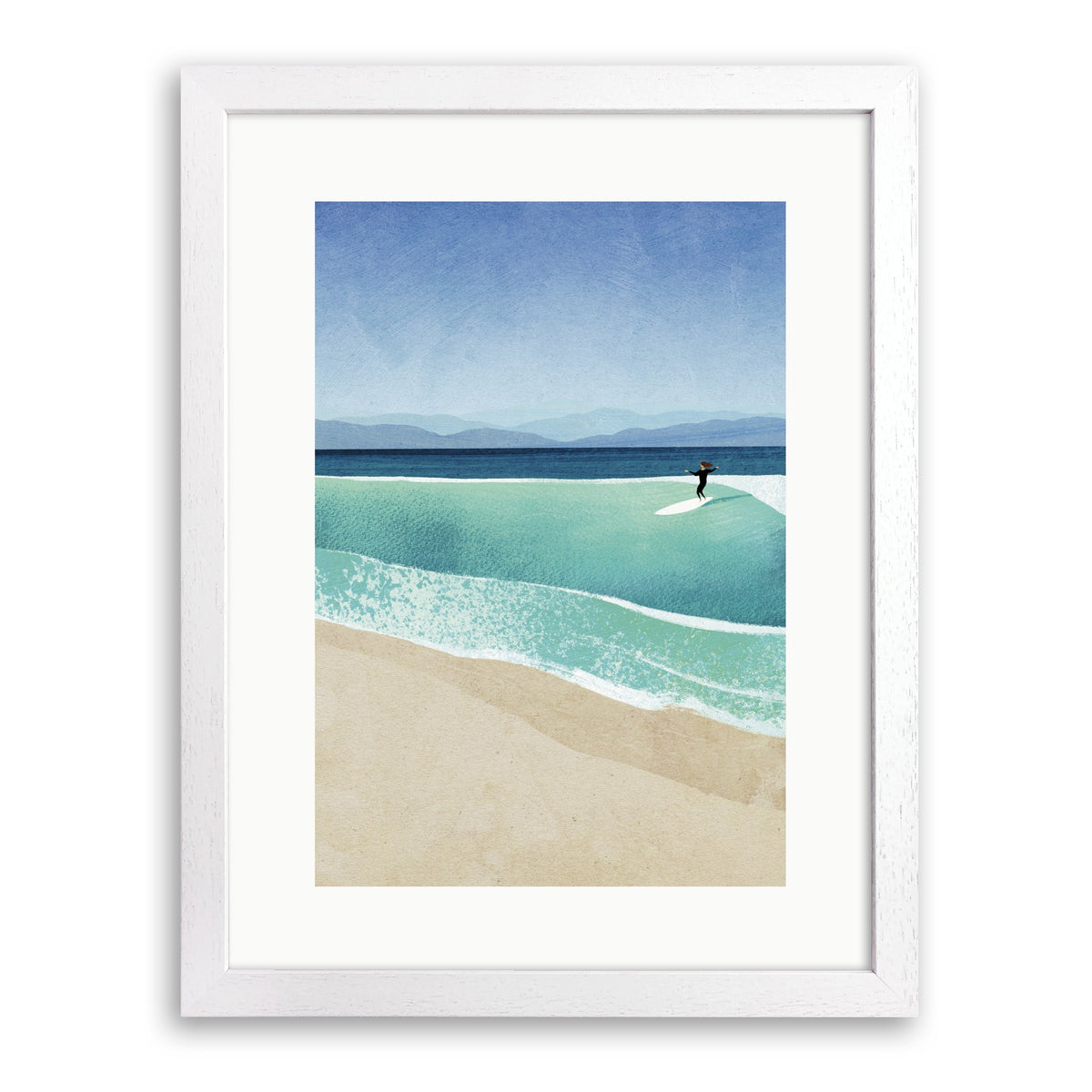 White wood framed print of a surfer riding a turquoise wave towards a sandy beach with distant mountains