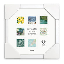 Empty square white wood 30 x 30 cm picture frame with glass front and protective corners